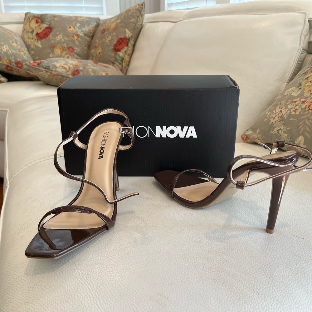 Brand new, never worn. Beautiful brown high heeled sandals. Size 6
